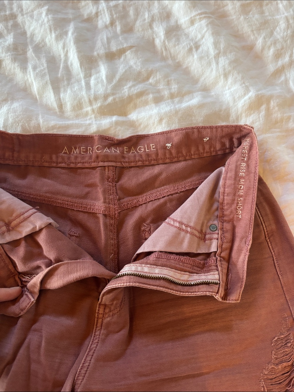 American Eagle Outfitters Rust Pink Distressed High-Rise Denim Shorts - Picture 2 of 4
